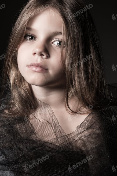 Preview: Serious Girl with Long Brown Hair and Black Fabric