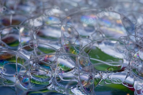 Preview: Closeup shot of details on many clear soap bubbles