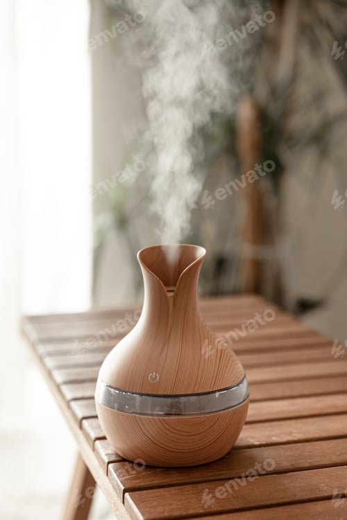Preview: Aroma oil diffuser lamp on a blurred background.
