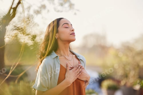 Preview: Mixed race woman relax and breathing fresh air outdoor at sunset