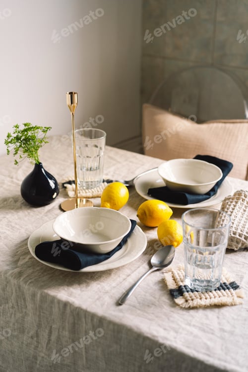 Preview: Vintage table setting with Linen napkins and yellow lemons.