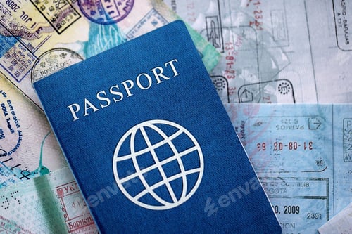 Preview: One fictional passport on big amount of passport pages full of colorful stamps after travel