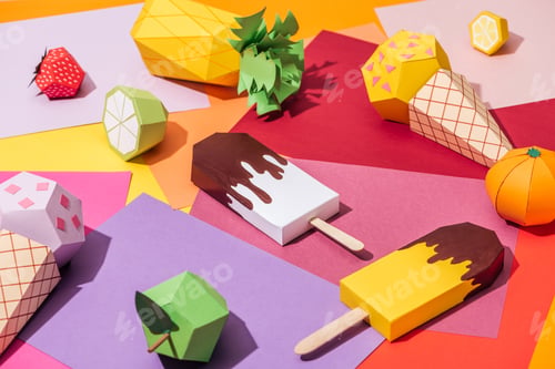 Preview: origami ice cream and handmade cardboard fruits on multicolored paper