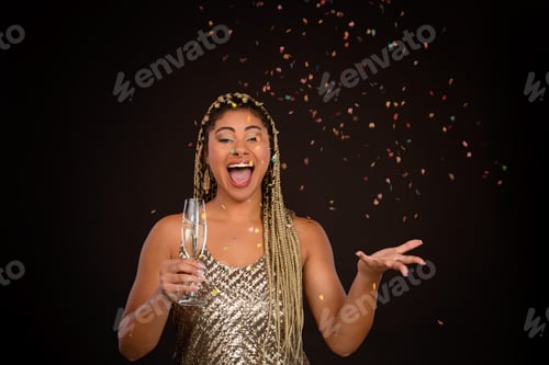Preview: Portrait of happy multiracial woman celebrating with glass of wine.