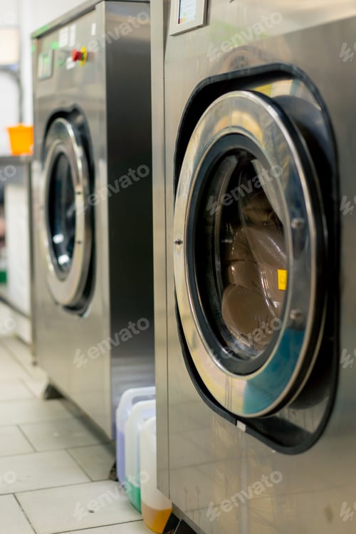 Preview: close up professional dry cleaning washing machine washing process professional delicate equipment