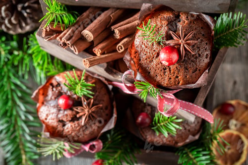 Preview: Top view of gingerbread muffins for Christmas with cranberry