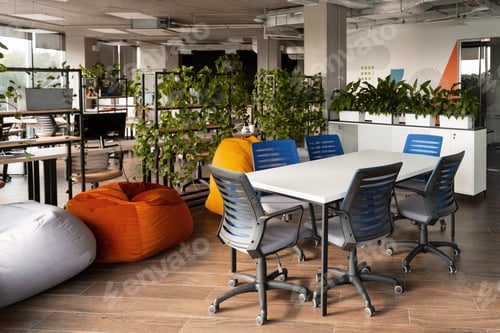 Preview: Modern coworking space with plants and beanbag chairs promoting wellbeing