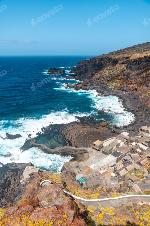 Preview: View from above of the fishing village of Pozo de las Calcosas on the island of El Hierro the cliffs