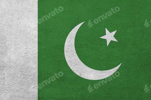 Preview: Pakistan flag depicted in bright paint colors on old relief plastering wall close up