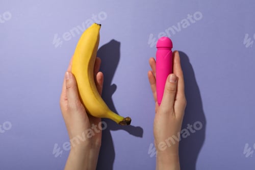 Preview: A collection of sex toys on a purple background.