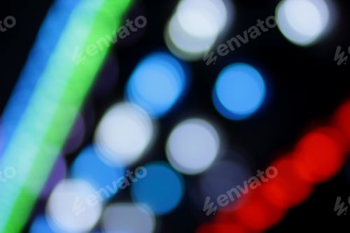 Preview: Blue, Red, Yellow, Blue, White Blurred Festive Bokeh Background With Stars For Christmas