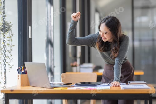 Preview: Happy excited successful business asian woman triumphing in office, Portrait of a cheerful Asian