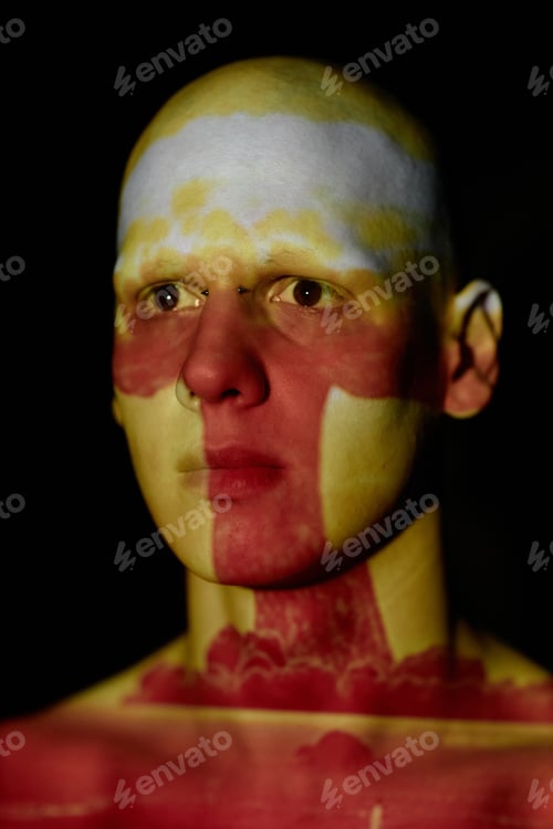 Preview: Portrait of Bald Man with Terrified Stare Looking at Atomic Explosion Projected on Face