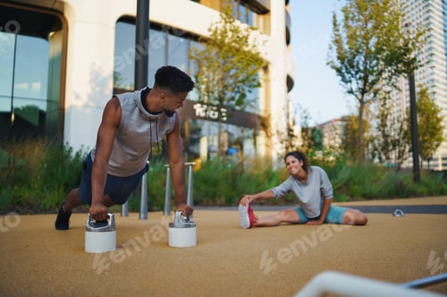 Preview: Man and woman couple friends doing workout exercise outdoors in city, talking