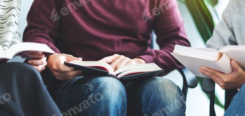 Preview: Group of young people sitting and enjoyed reading books together