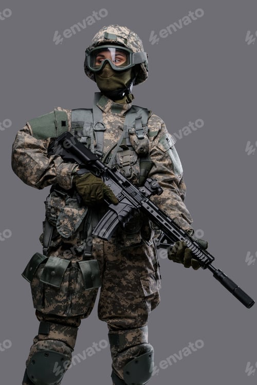 Preview: Determined soldier woman with rifle against gray background