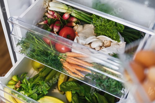 Preview: Zero waste grocery in fridge. Fresh vegetables in opened drawer in refrigerator