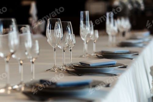 Preview: luxury wedding arrangement of stylish glasses plates on napkins