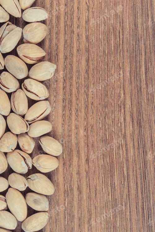 Preview: Pistachio nuts containing vitamins and minerals. Healthy eating. Place for text