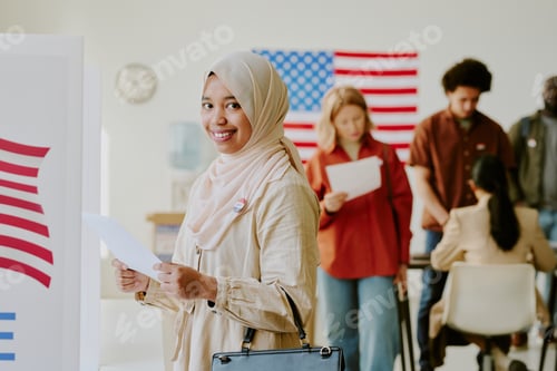 Preview: Cheerful Muslim Woman With Ballot Paper