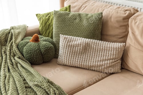 Preview: Autumn Living Room with Fabric Pumpkins, Cushions, and Cozy Textiles.