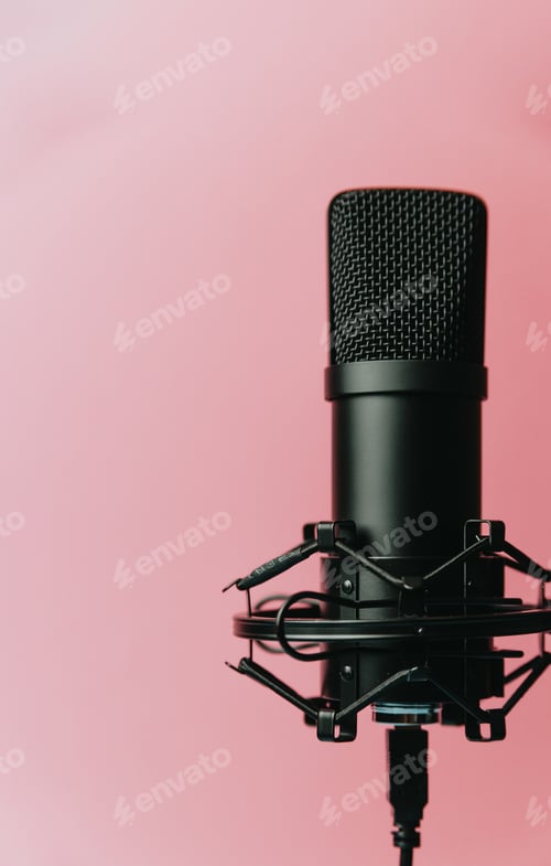 Preview: Minimalistic image of a streaming microphone over an pastel pink background with copy space