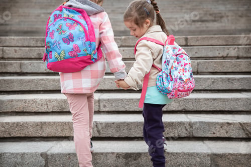 Preview: Back to school, Two girls hold hands and go to school.
