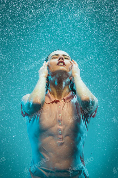 Preview: The portrait of young beautiful woman in the rain