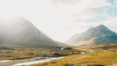 Preview: Beautiful light-flooded landscape in the Scottish semi-snowy mountains of the Glencoe Valley