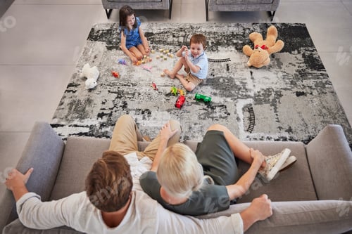 Preview: Family, children and living room with a girl and boy playing on the floor of their home while their