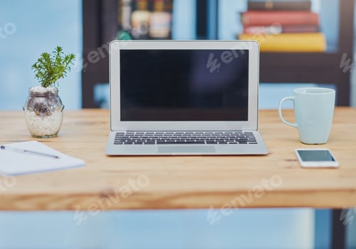 Preview: Office requirements. Still life shot of a laptop at a workstation in an office.