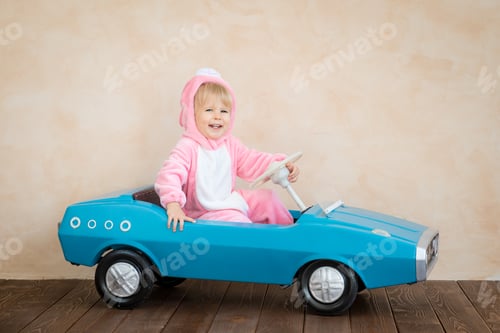 Preview: Funny kid wearing Easter bunny