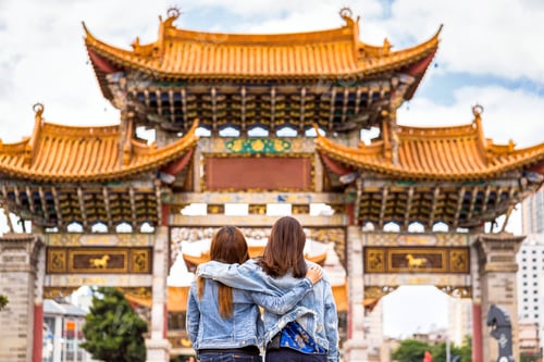 Preview: back side of Three asian happiness women walking and sightseeing together when travelling