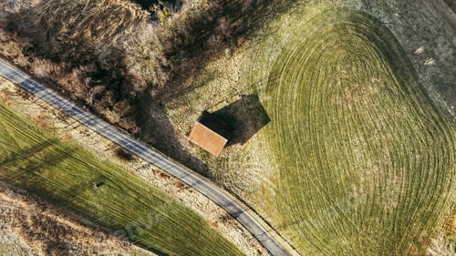 Preview: Aerial View of Spring Field with a Cottage and Shed, Nature from Above