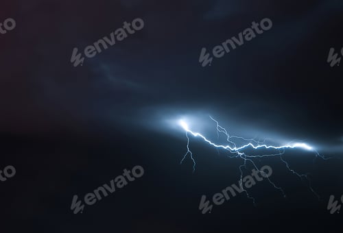 Preview: Lightning in the night sky. Thunderstorm over the city. Stormy clouds and rainy weather.