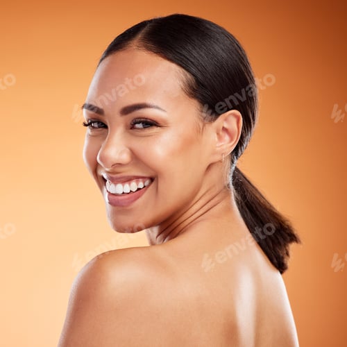 Preview: Face, beauty and skincare for woman with smile for facial health against a brown mockup studio back