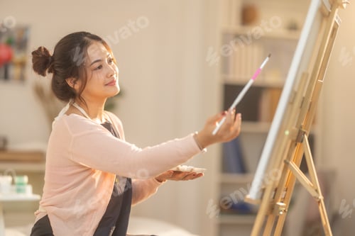 Preview: Woman Painting at Home Studio