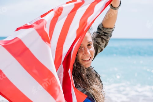 Preview: A girl posing on the beach with flag USA.