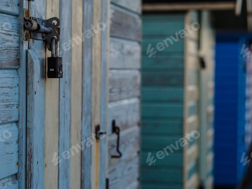 Preview: Scenic view of a padlock on a wooden beach hut