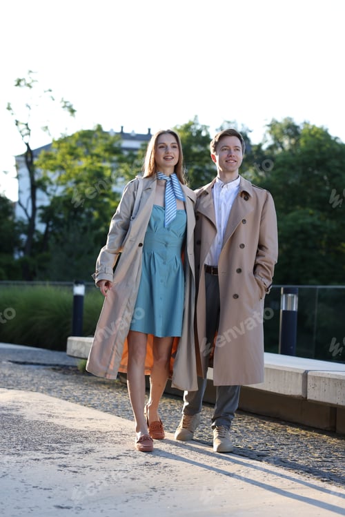 Preview: Lovely couple walking together on city street