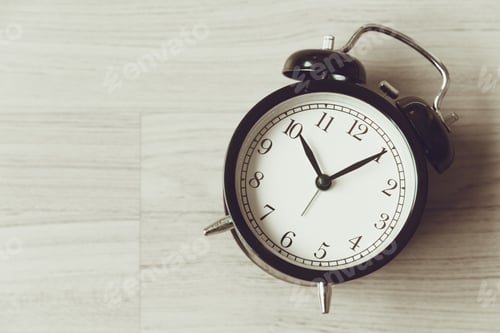 Preview: Bell clock old retro style at wooden background with copy space for text, history memory time