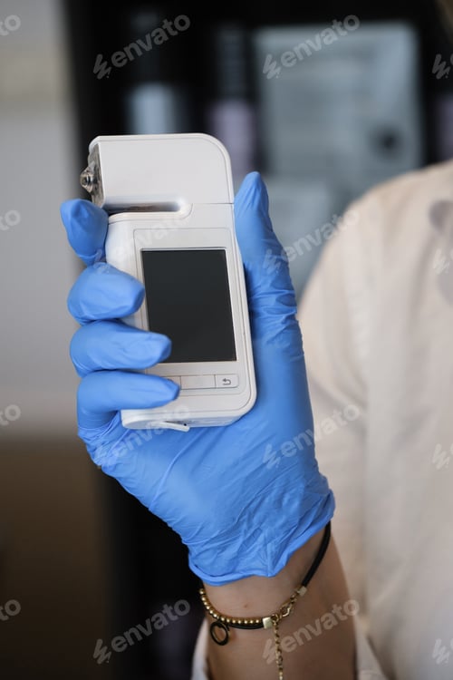 Preview: Doctor holding trichoscope for structure of the hair diagnostic trichologist