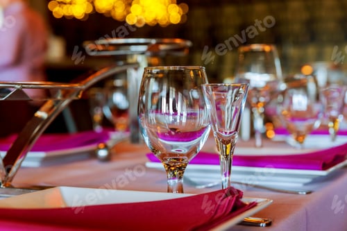 Preview: Served for a banquet catering table with wine glasses and plates for food