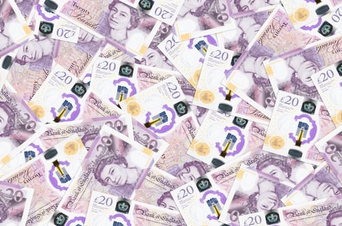 Preview: 20 British pounds bills lies in big pile. Rich life conceptual background