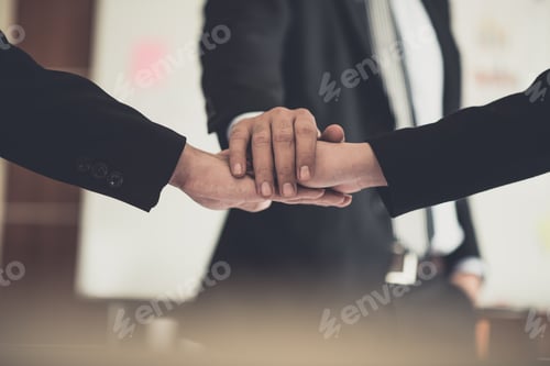 Preview: success and winning concept - happy business team celebrating victory in office