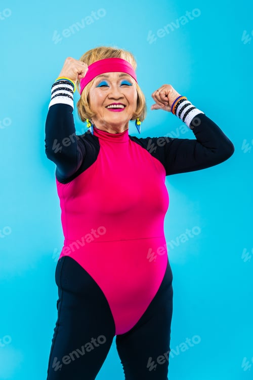 Preview: Happy and funny senior old woman on colorful background