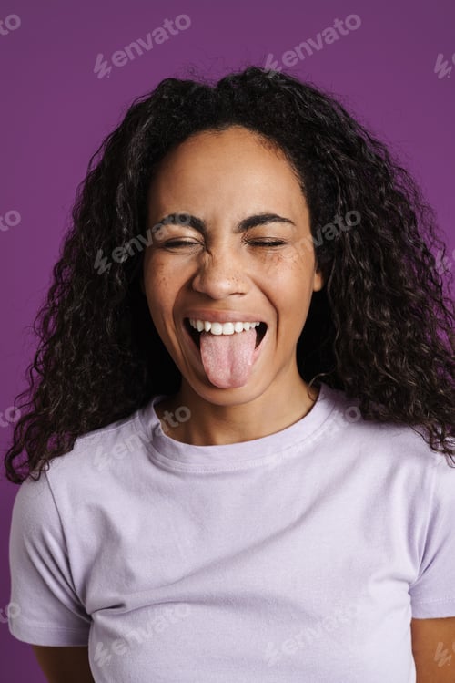Preview: Young black woman with wavy hair showing her tongu