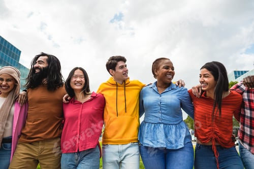 Preview: Young diverse people having fun walking together outdoor - Focus on center man face