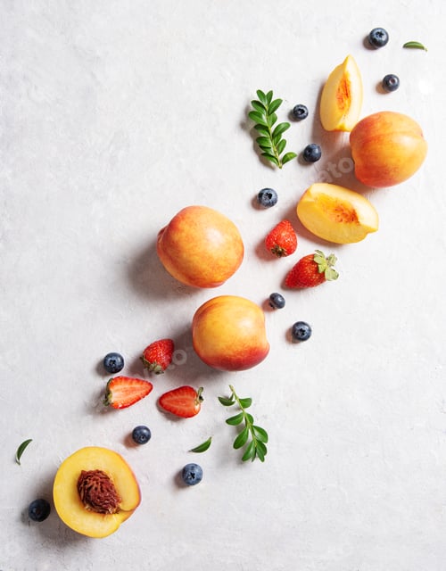 Preview: Flat lay with fresh organic summer berries and fruits of strawberries, blueberries and peaches