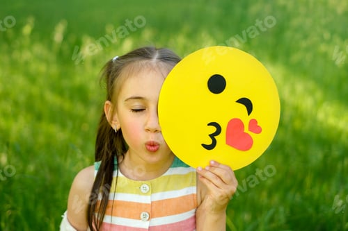Preview: Girl pouted lips sending an air kiss closes with emoji
